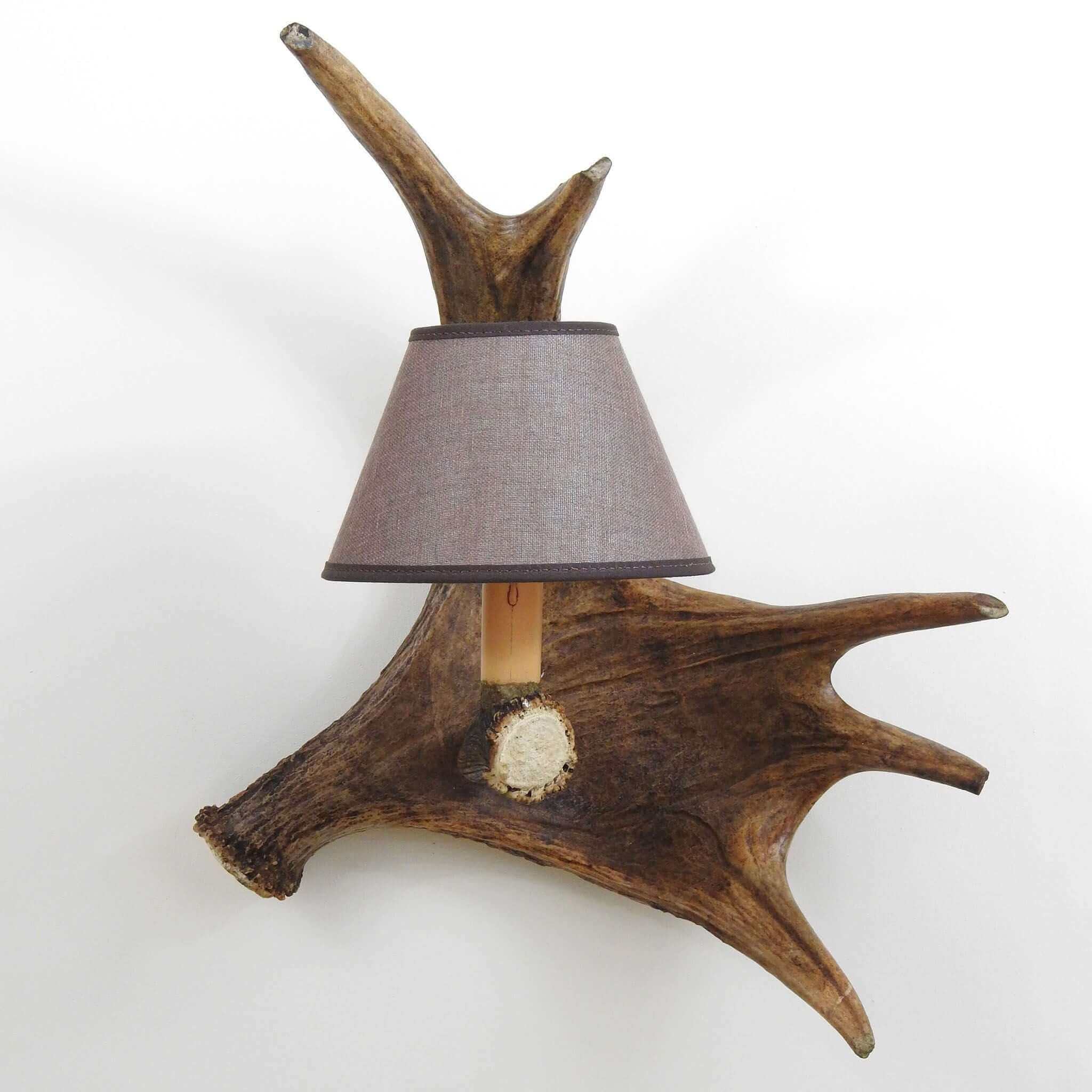 Real antler sconce made of single moose antler.