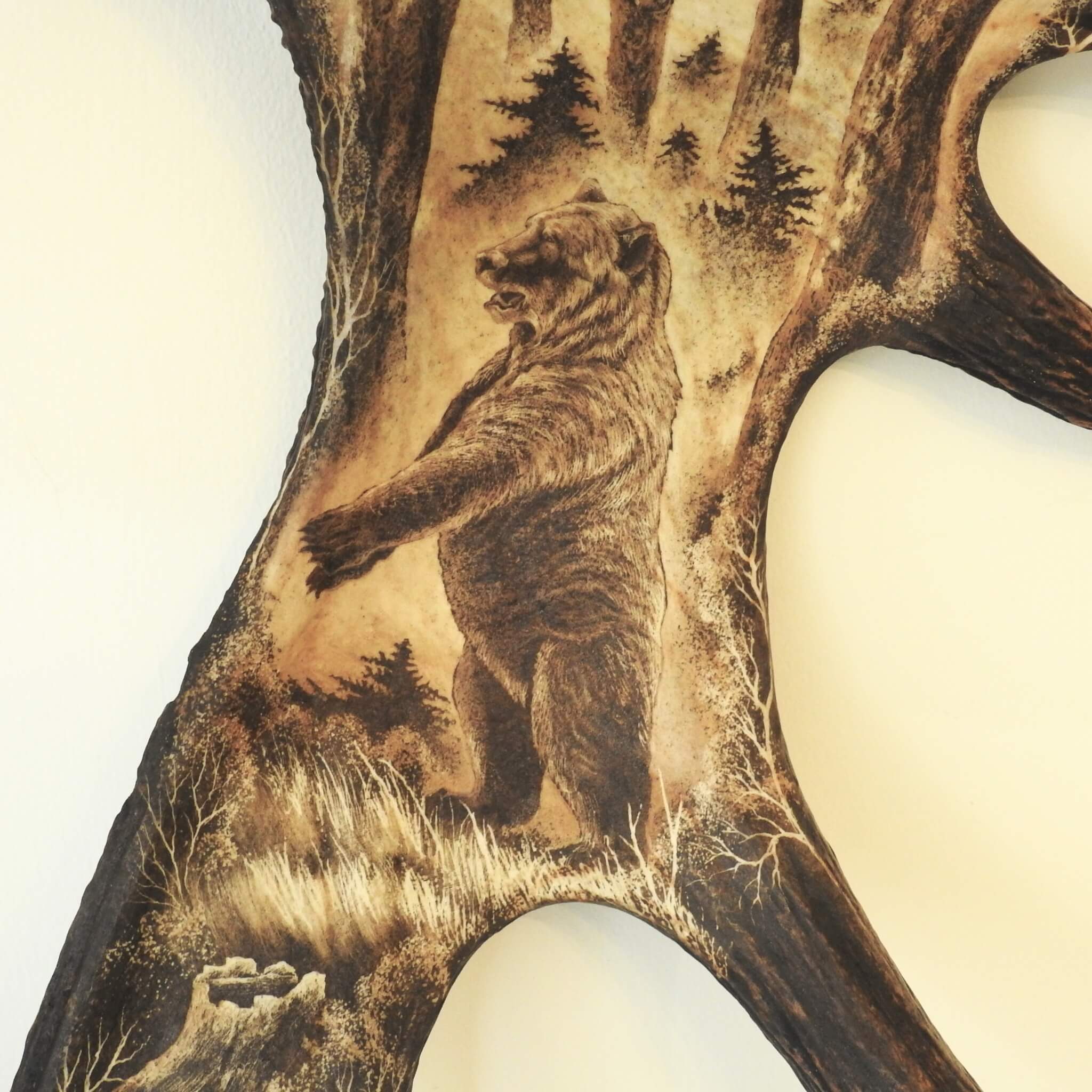 Carving with roaring bear.