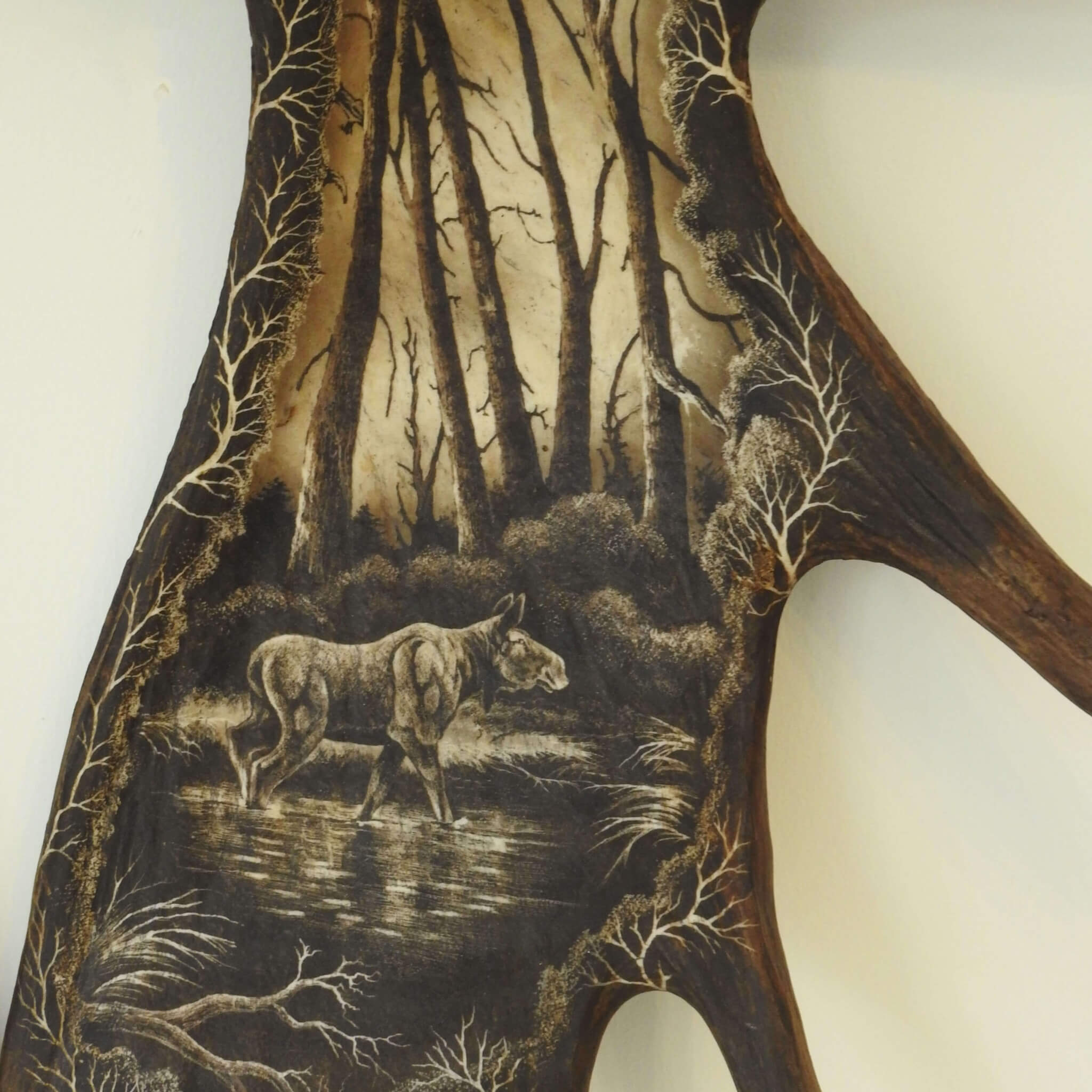 Carving of female of moose.