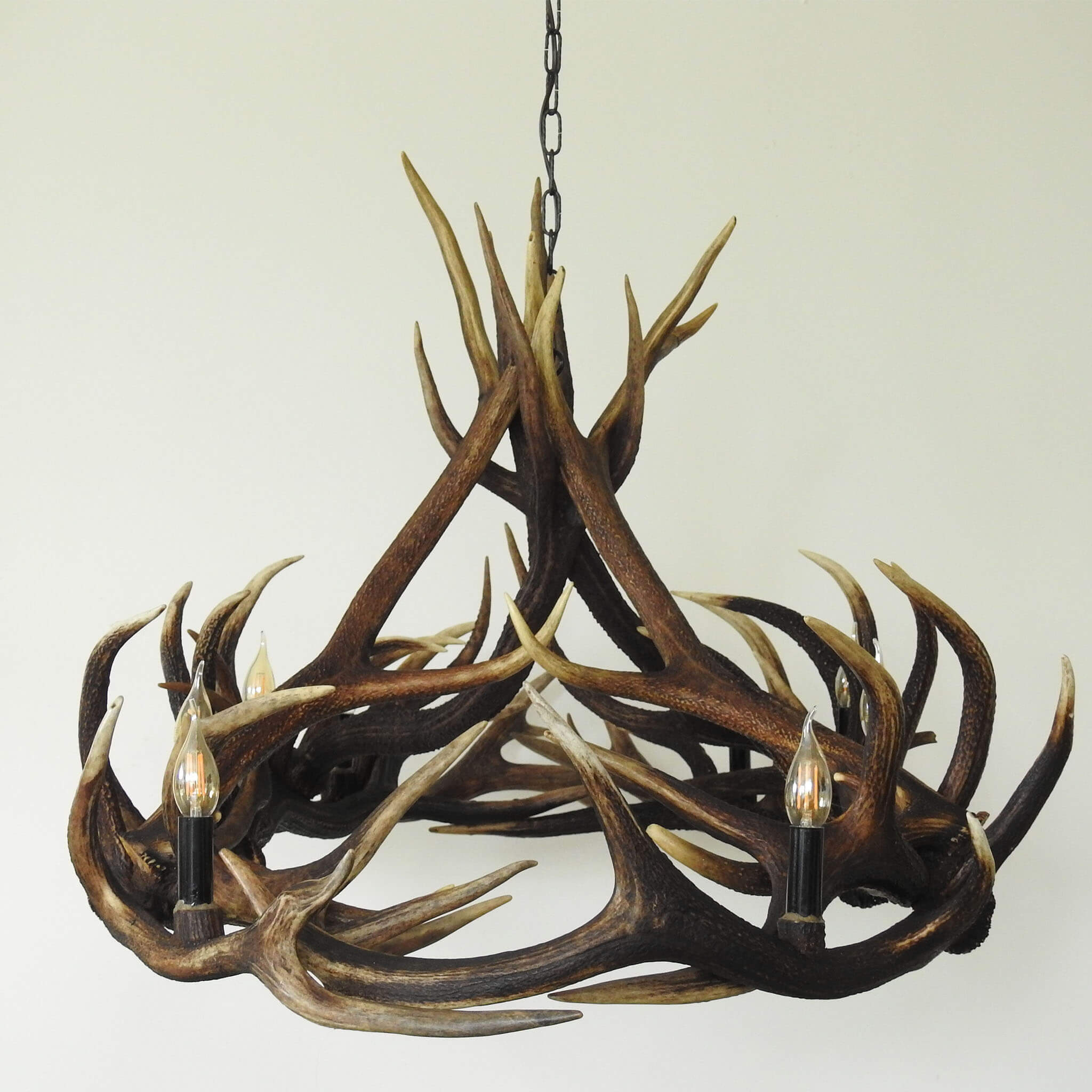 Antler chandelier with black elements.