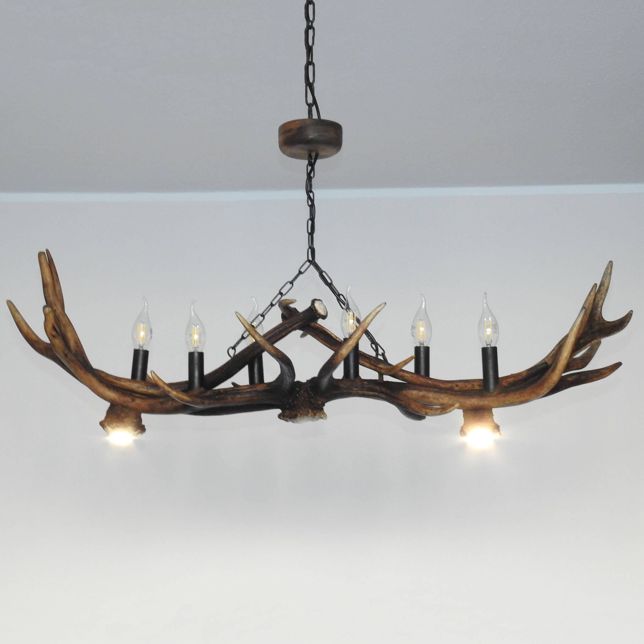 Long antler chandelier in modern design style.