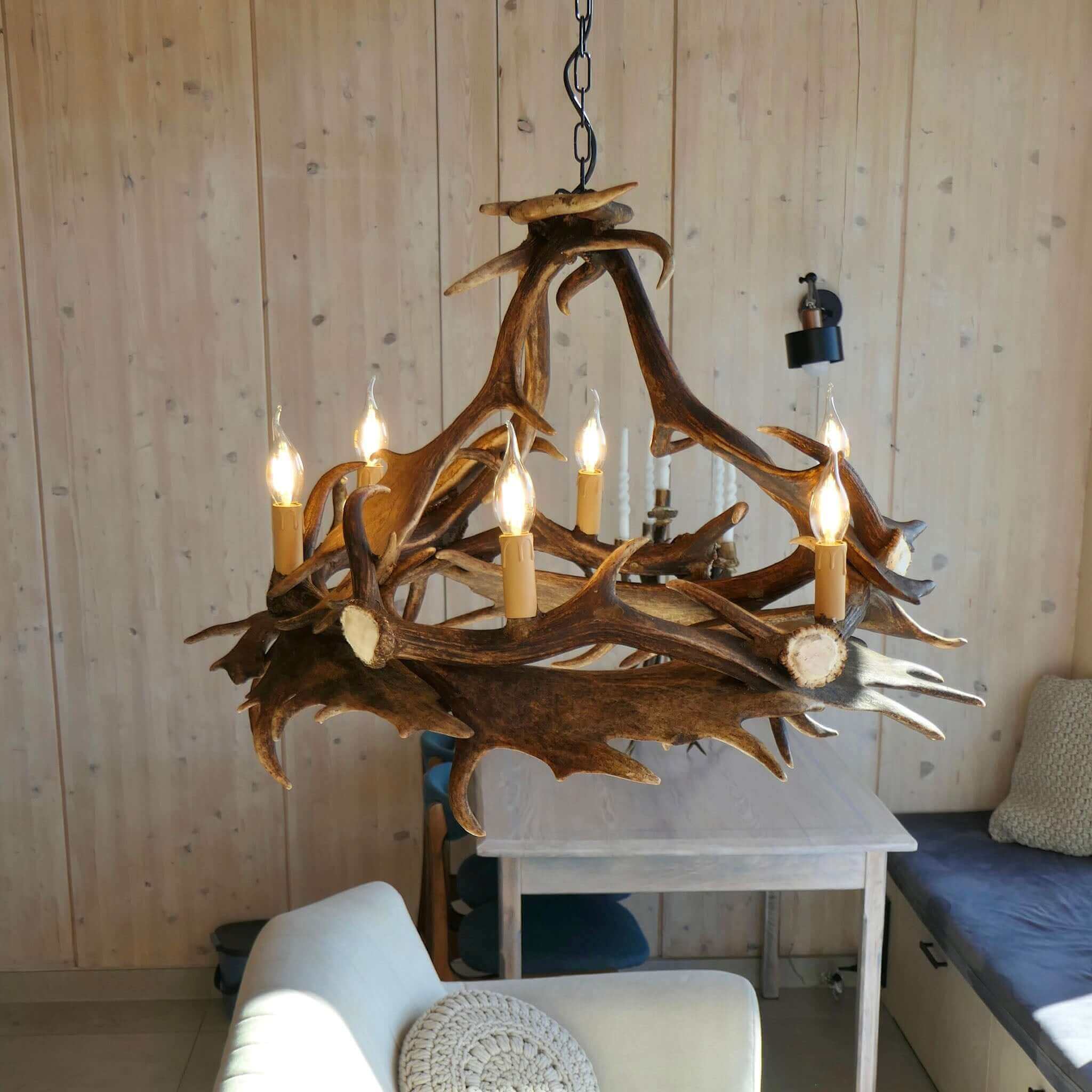 Real fallow deer antler chandelier in round shape.