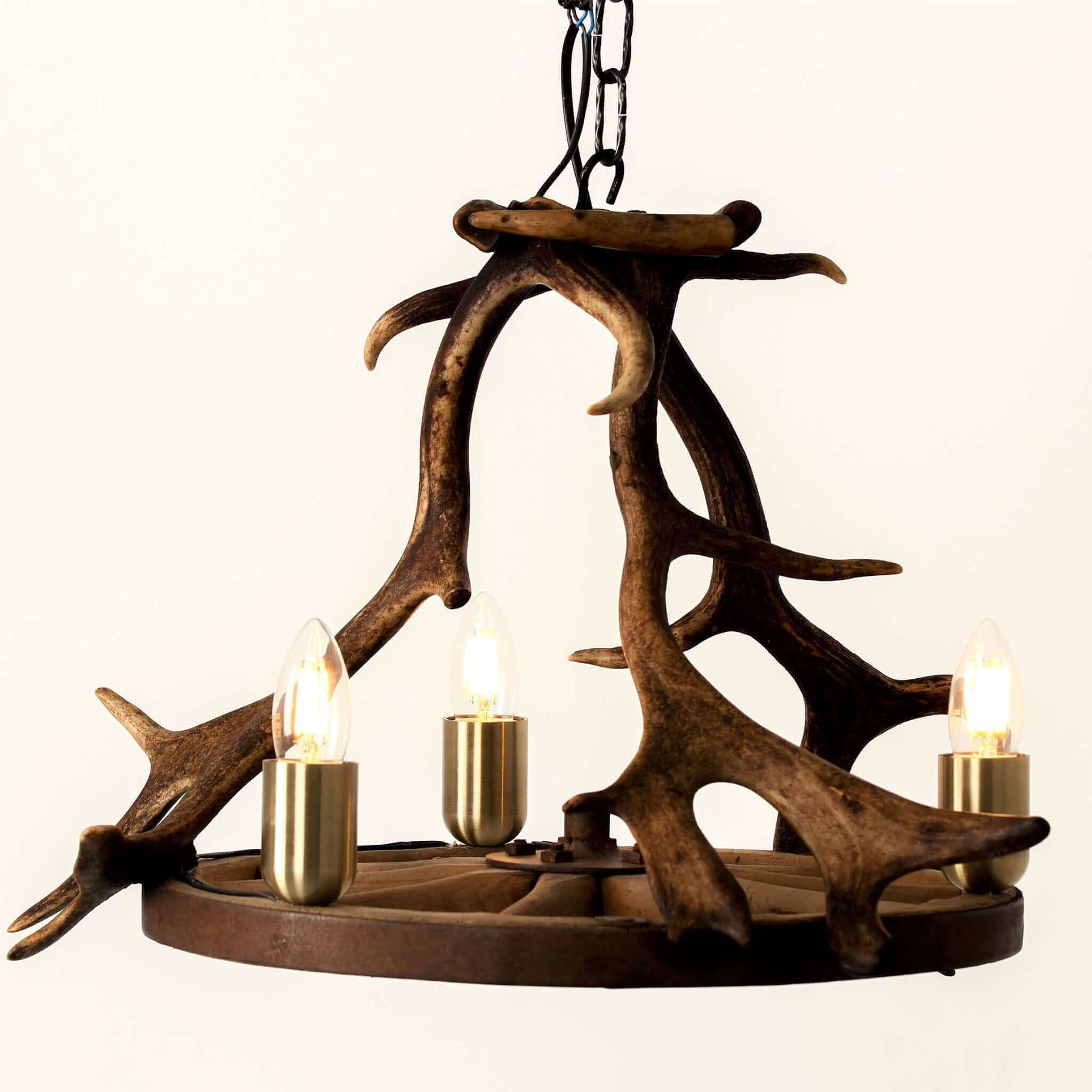 Wagon wheel antler chandelier.