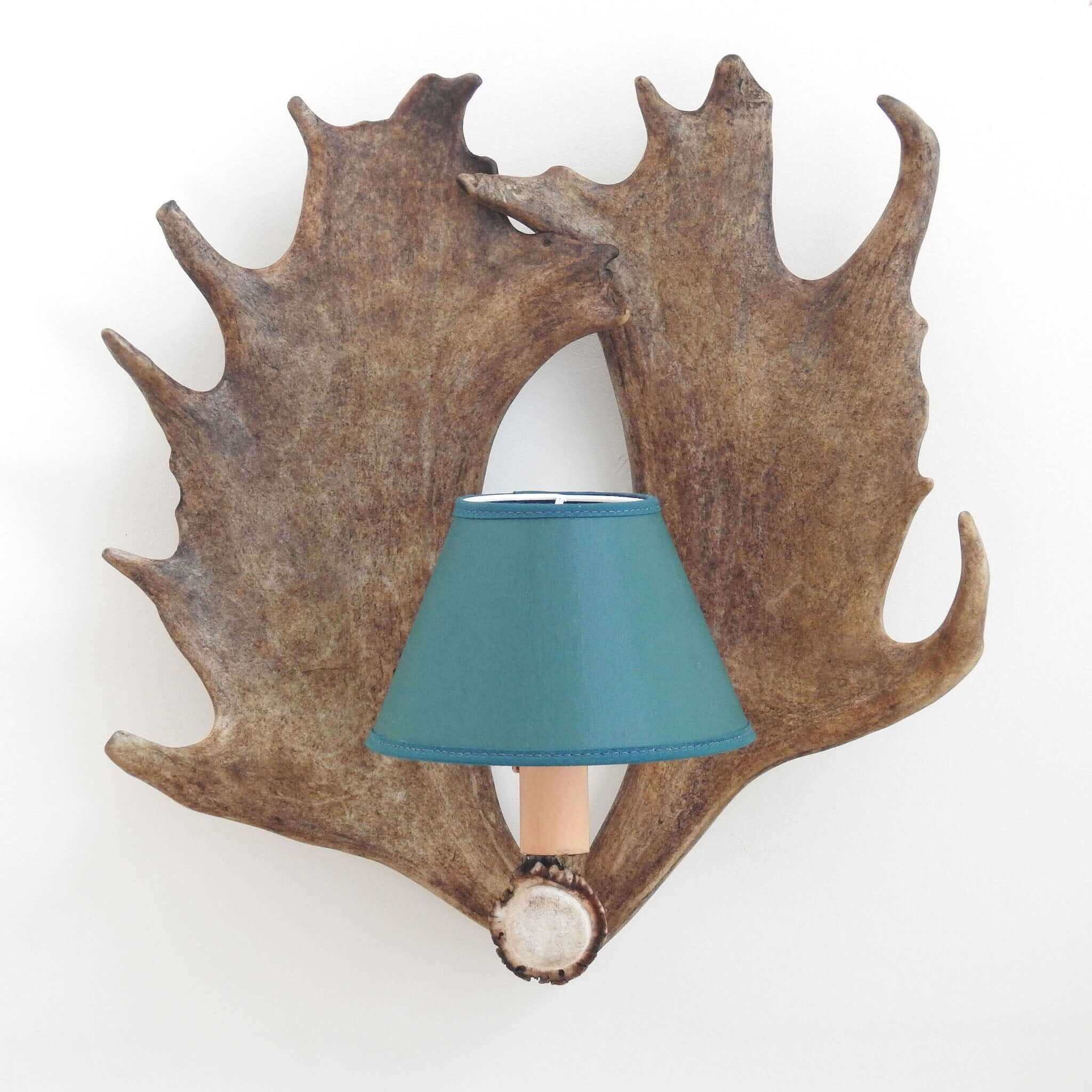 Rustic style antler sconce.