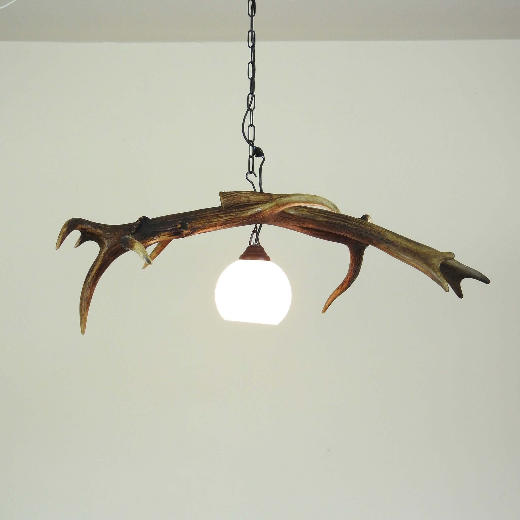 Real antler light fixture for 1 light.