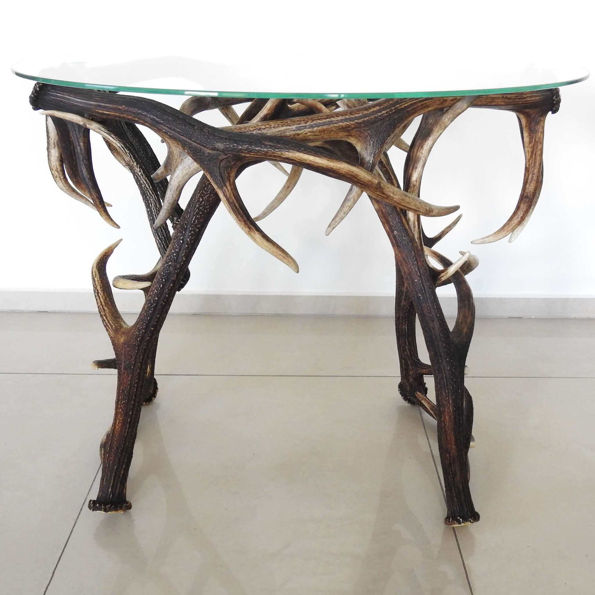 Oval table mad of antlers.