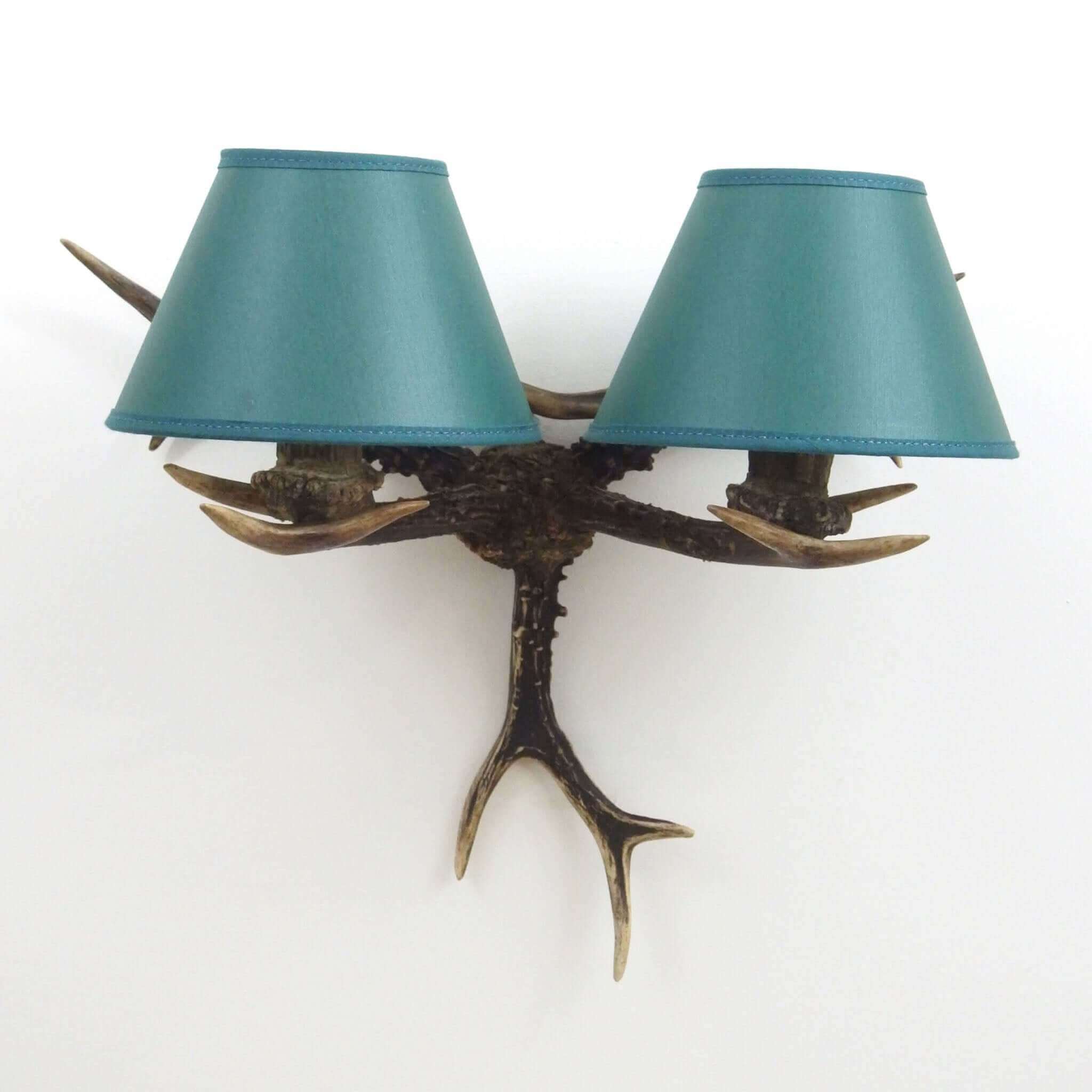 Real antler sconce with shades.