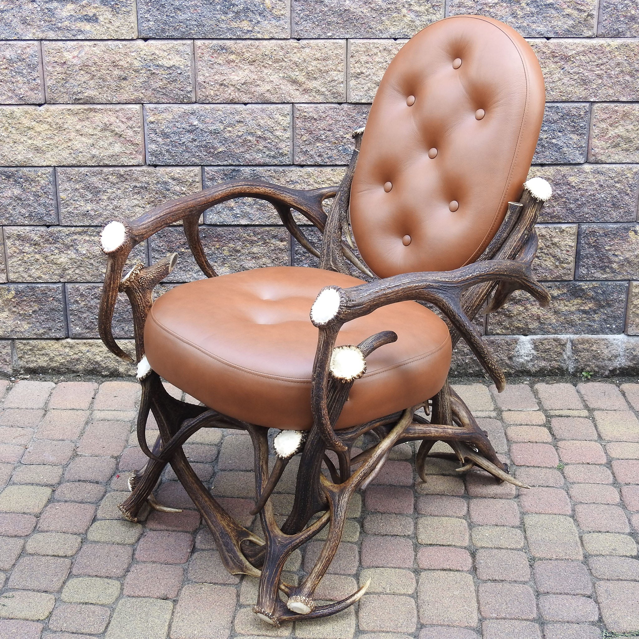 Antler chair with carmel upholstery.