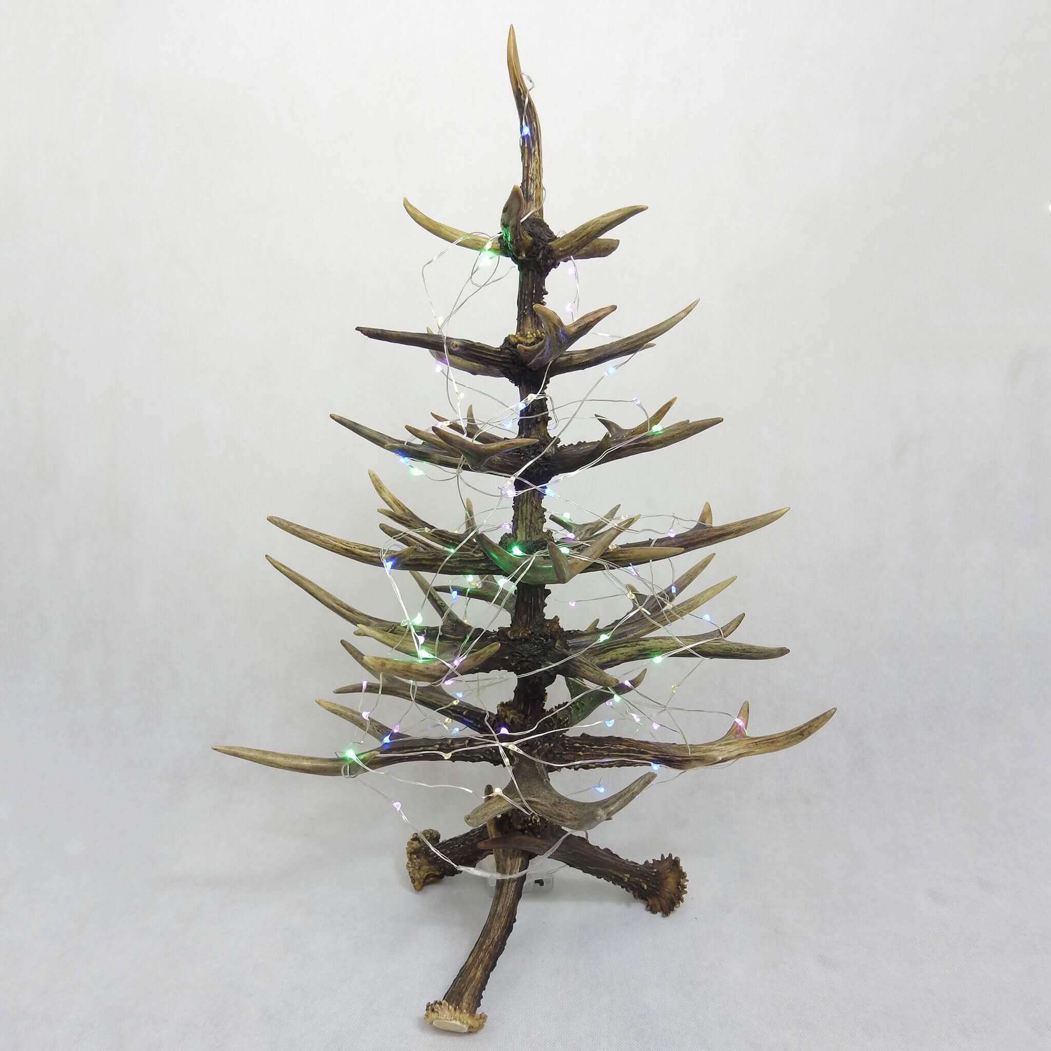 Bring a rustic charm to your holiday decor with this real deer antler Christmas tree.