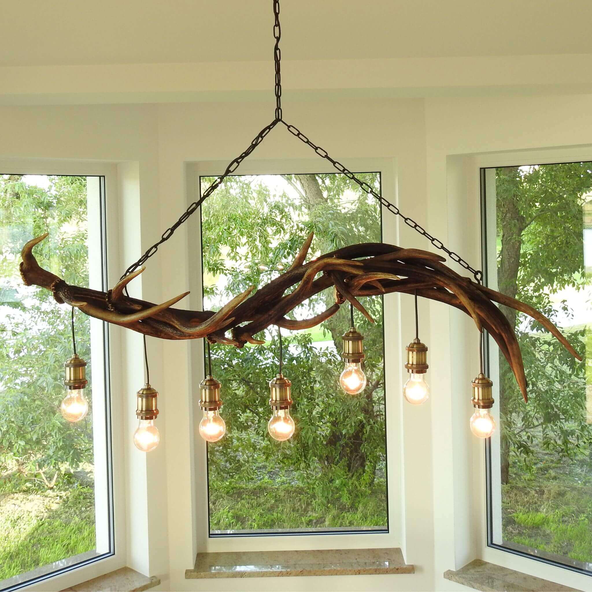 Real antler chandelier for dining room.
