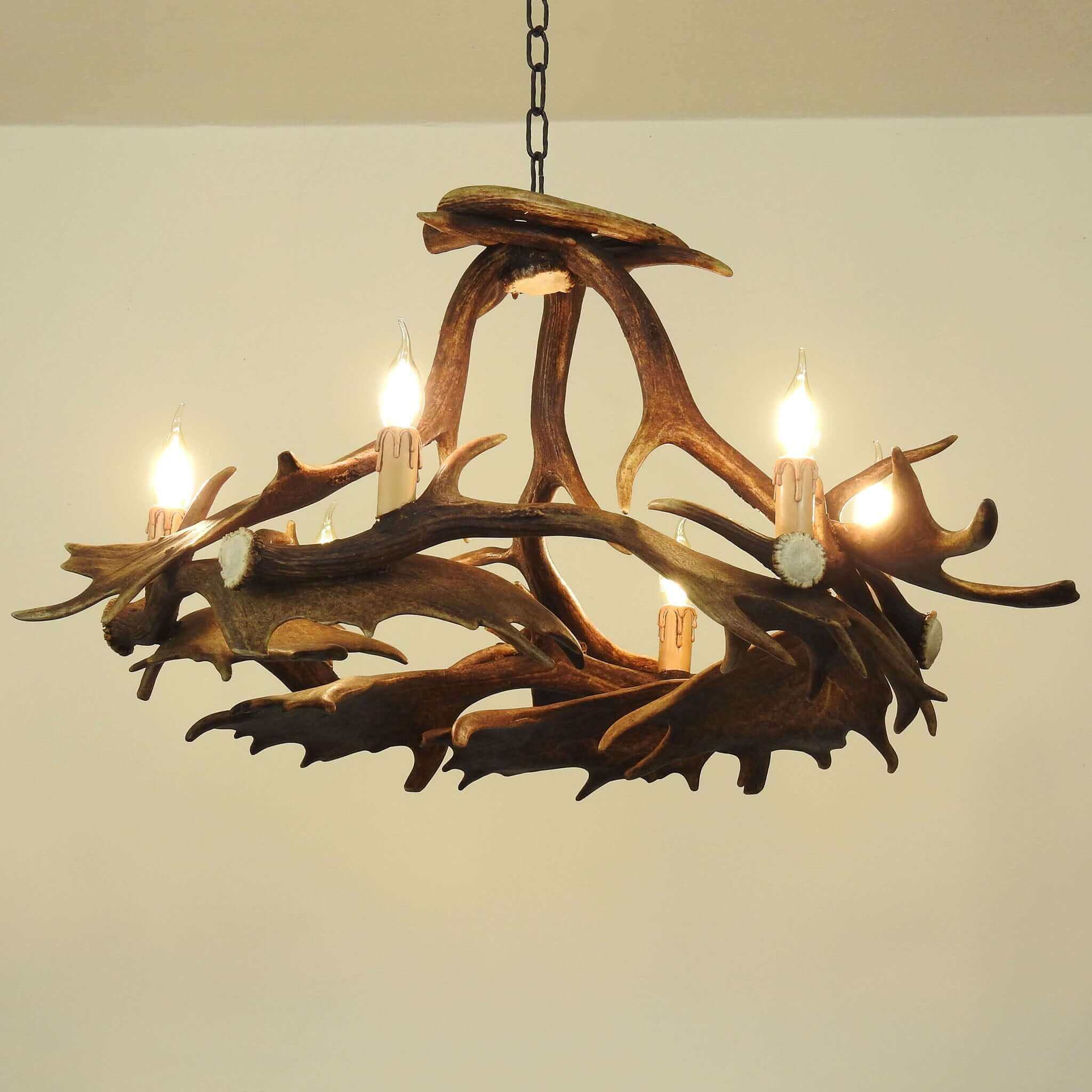 6-lights antler chandelier with bulbs up.