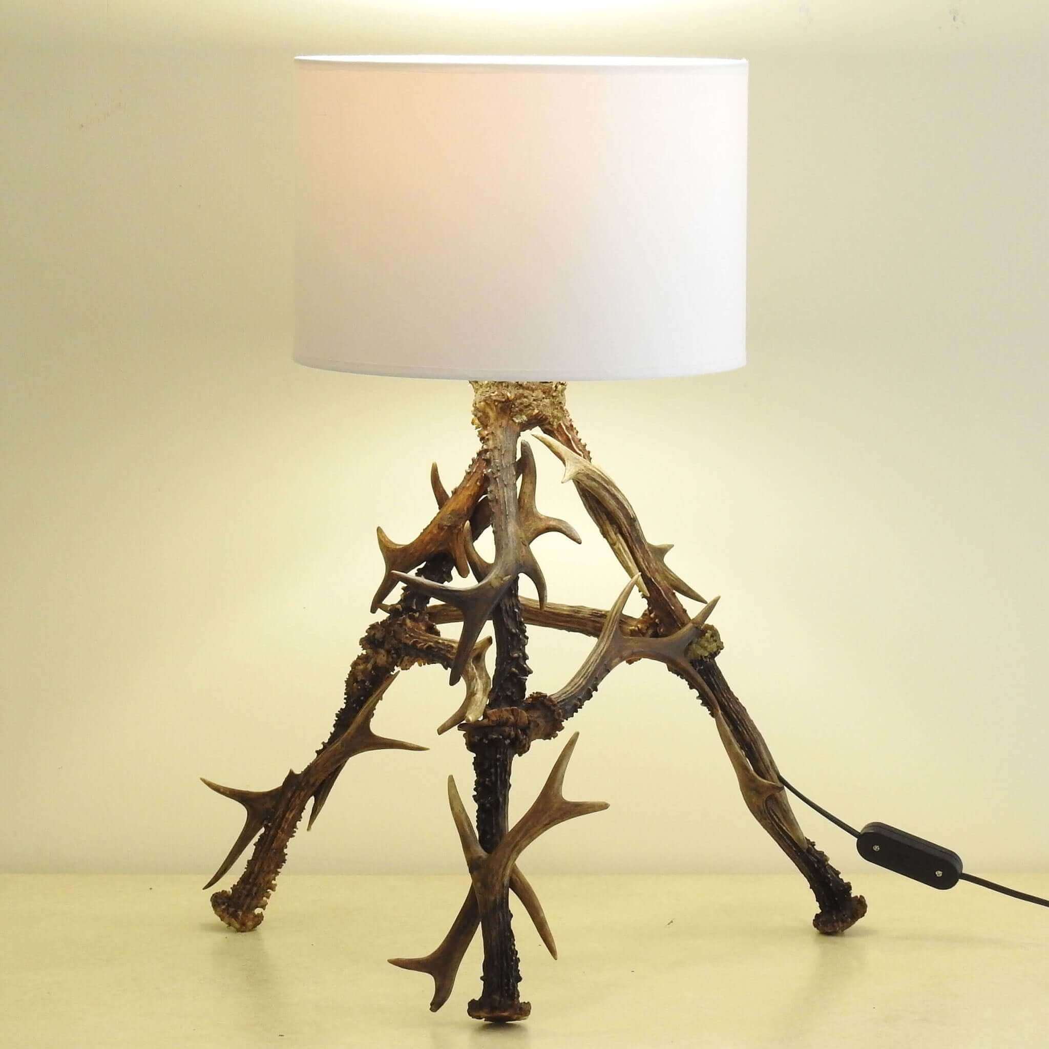 Antler lamp with shade.