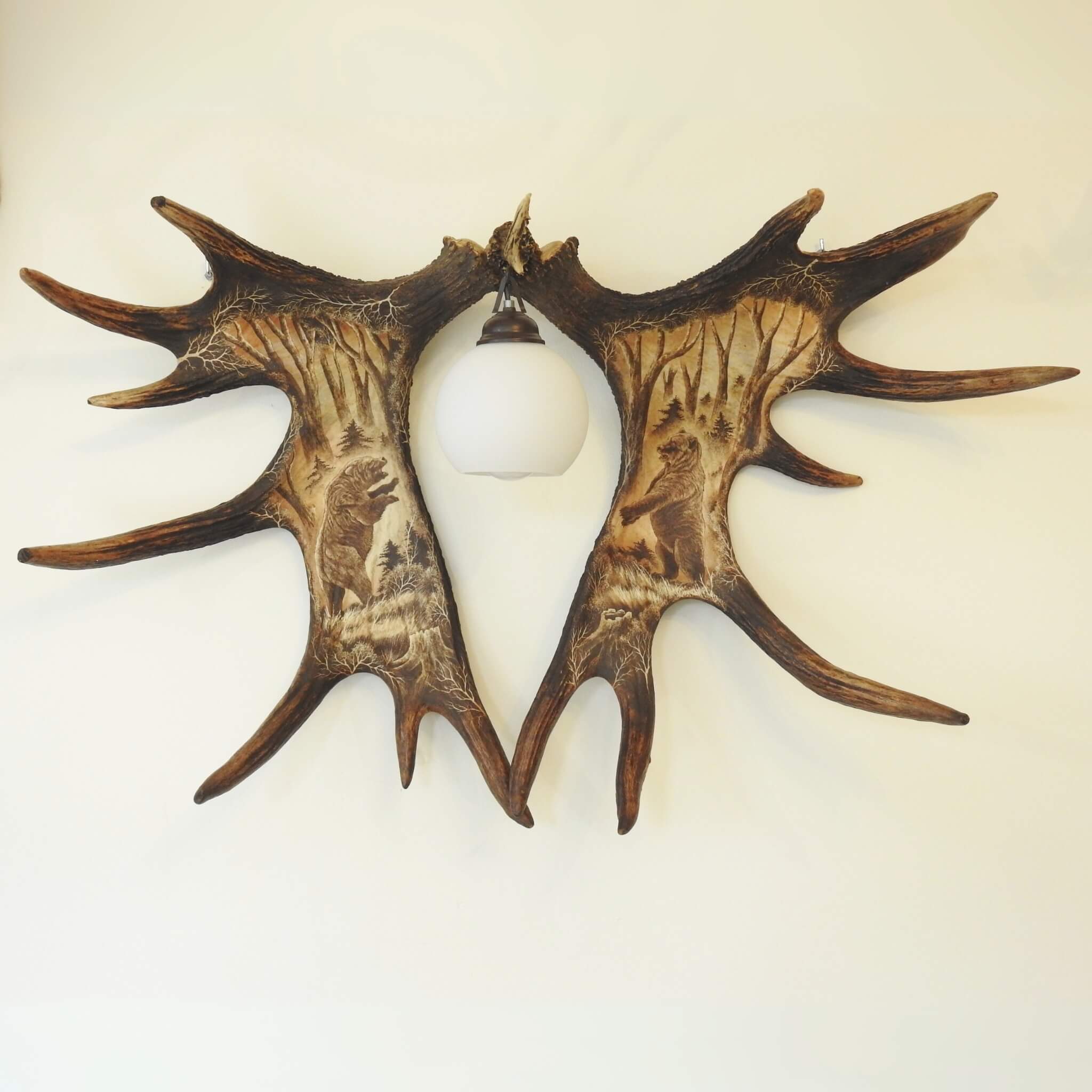 Real antler moose wall chandelier.