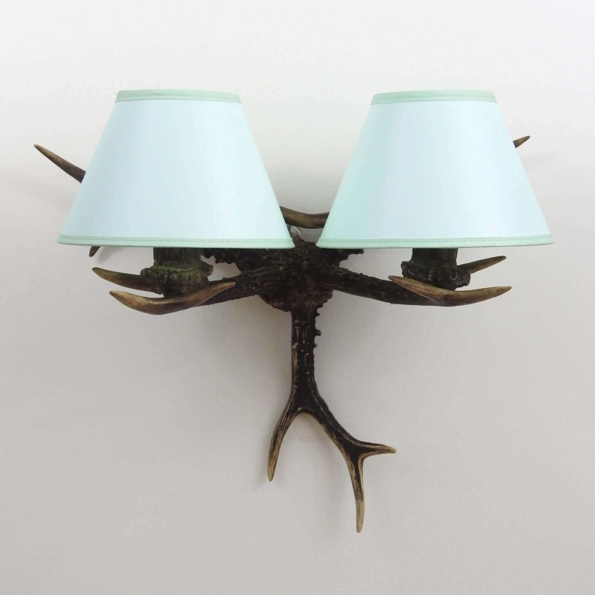 Real antler sconce with shades.