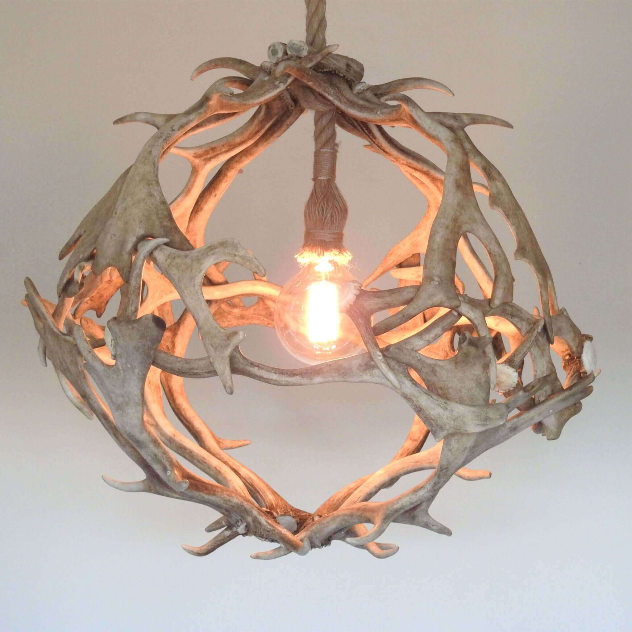 Farmhouse chandelier made of antlers.