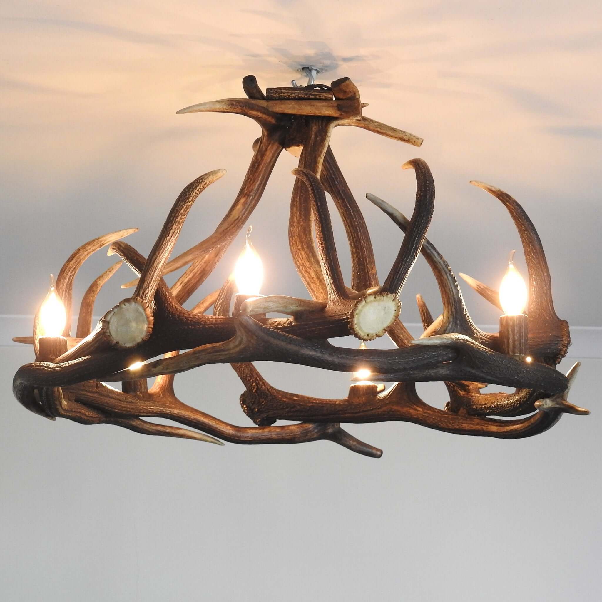 Real rustic style antler chandelier for 6 bulbs.