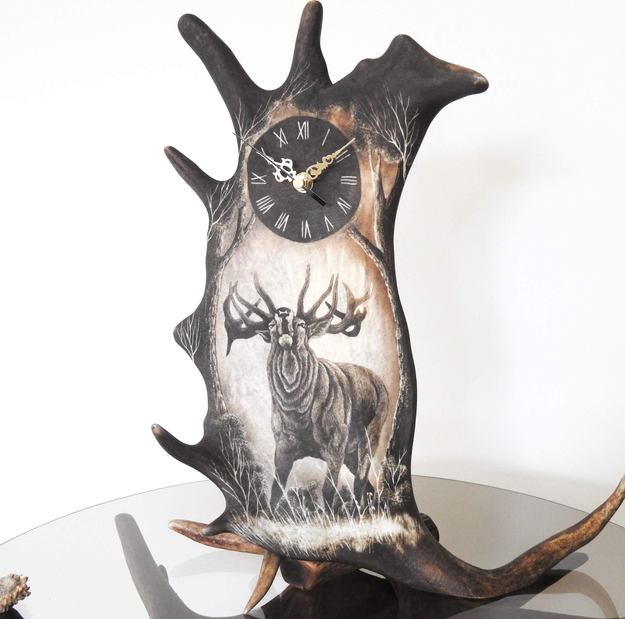 Vertical standing fallow deer antler with clock.