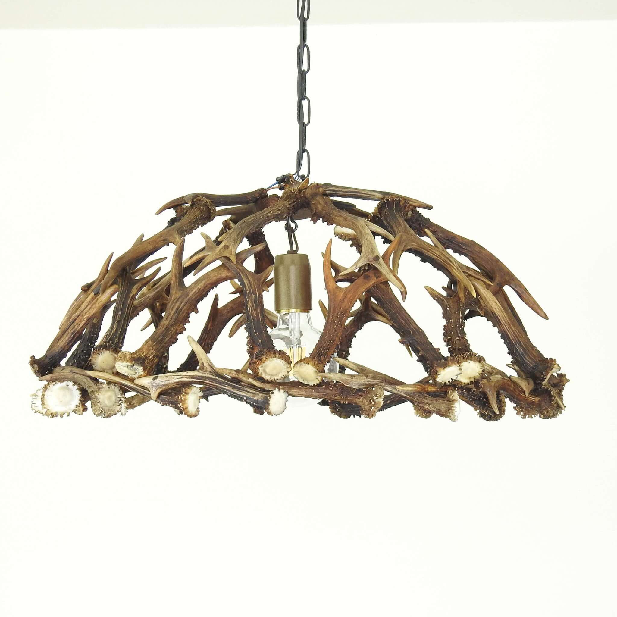 Real antler lamp for hanging over table.