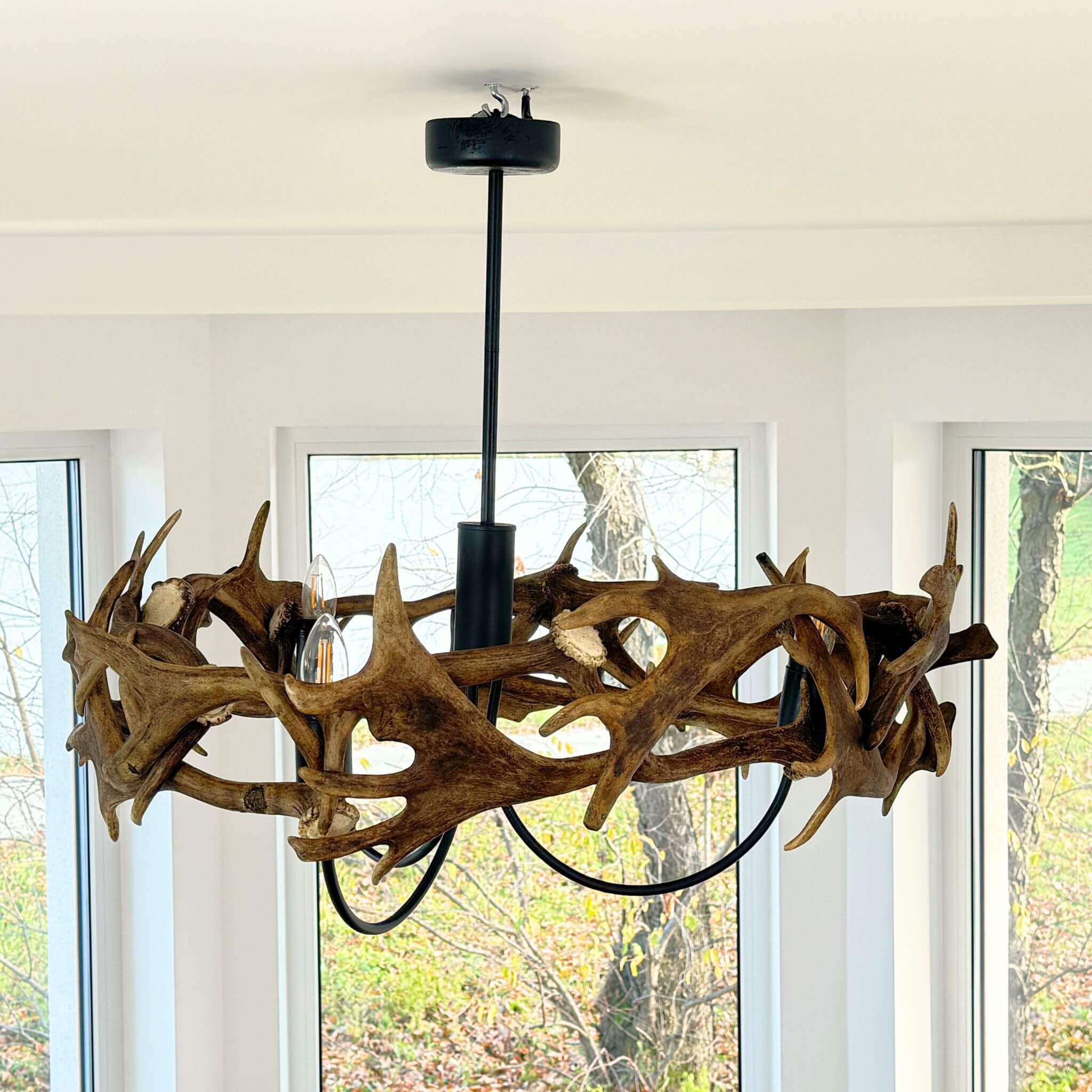 Metal chandeleir for 3 lights with antler ring.