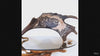 Real antler carving shows hed of eagle.